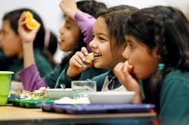 children eating at canteen